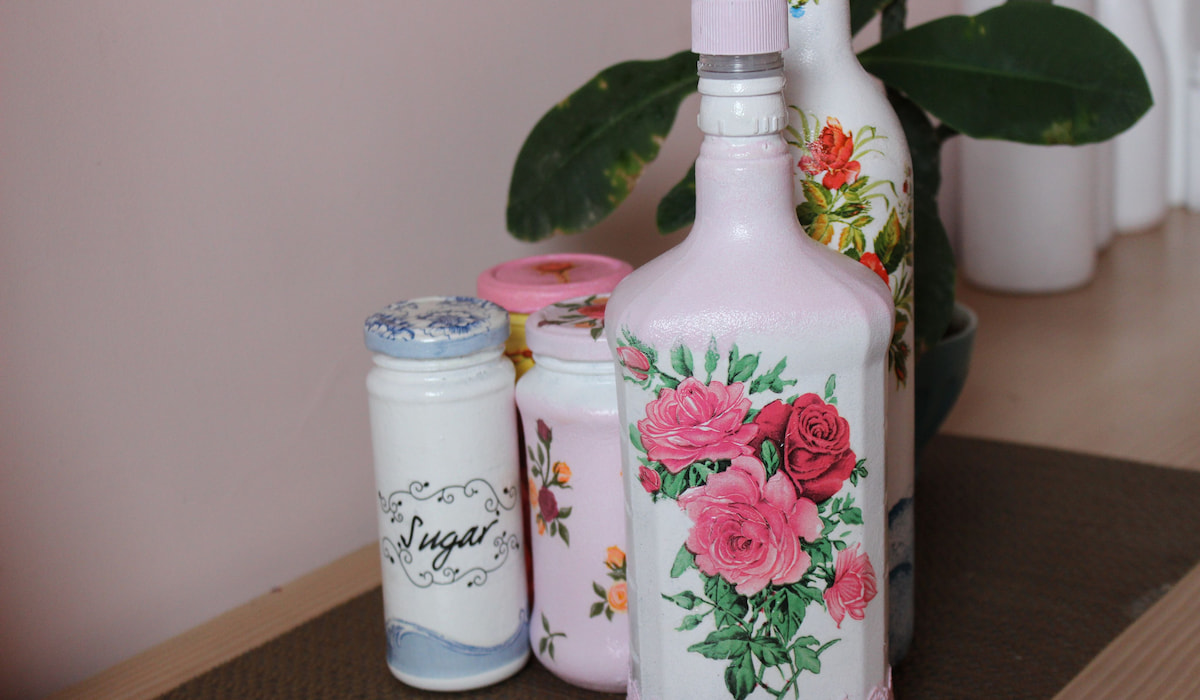 decoupage old empty plastic bottles with floral pattern