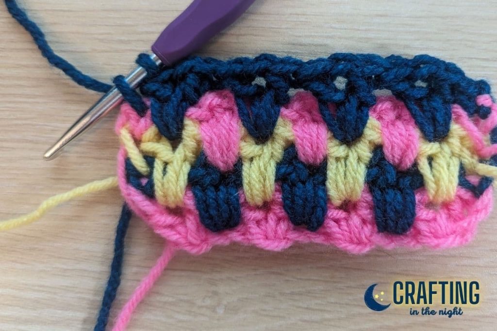 single crochet being placed at the end of a row.