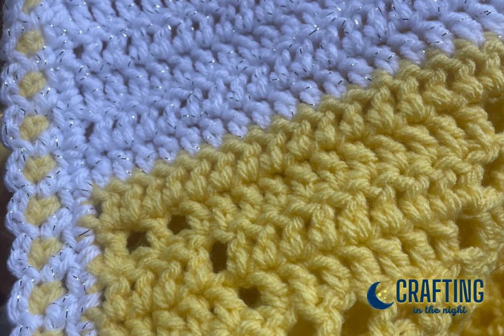 Close up details of Crochet Blanket , white and yellow yarn